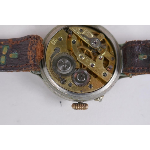 631 - A WWI trench watch, with illuminated Arabic numerals on a shaped white dial with subsidiary second d... 