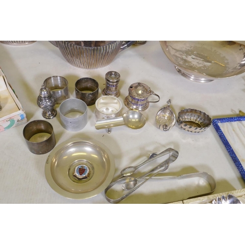 633 - A large quantity of silver plate to include an Elkington teapot, candelabras, flatware, spirit kettl... 