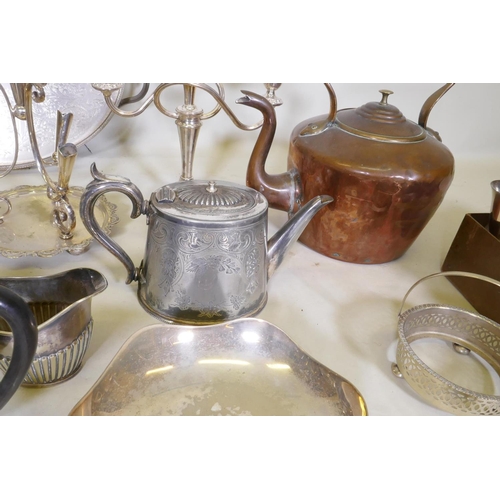 633 - A large quantity of silver plate to include an Elkington teapot, candelabras, flatware, spirit kettl... 