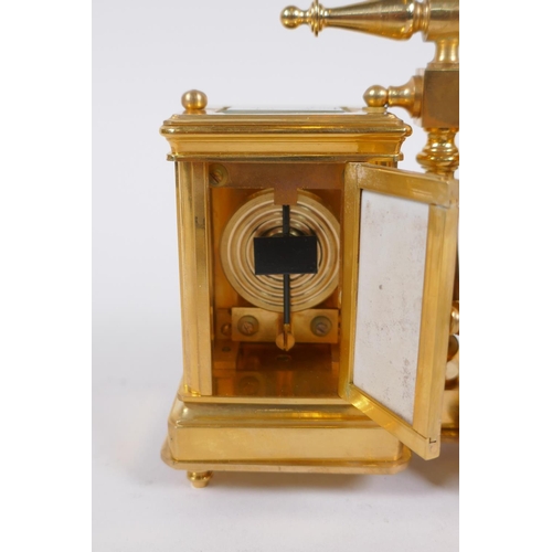 635 - An ormolu and Sevres style porcelain twin carriage clock and barometer, the dials decorated with flo... 