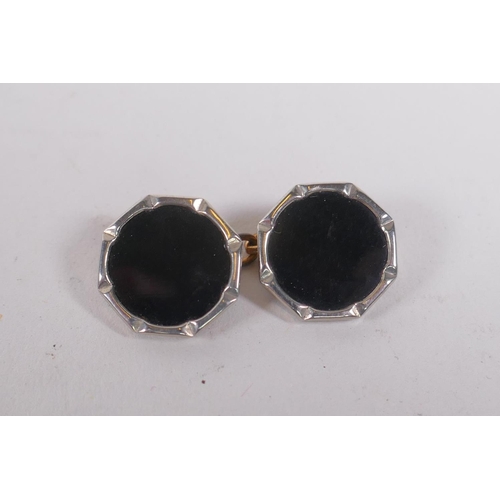 639 - A cased set of black enamel and white metal cufflinks and studs, 1 stud missing