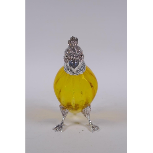 646 - A silver plated and yellow glass cockatoo claret jug, 15cm high