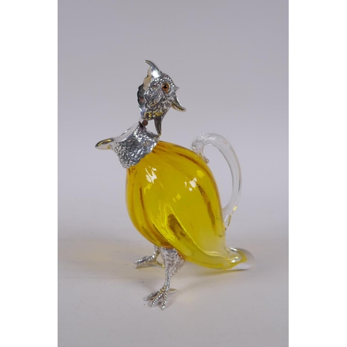 646 - A silver plated and yellow glass cockatoo claret jug, 15cm high