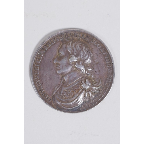 656 - Oliver Cromwell, Lord Protector, cast silver medal, 1653, by Thomas Simon, armoured and draped bust ... 