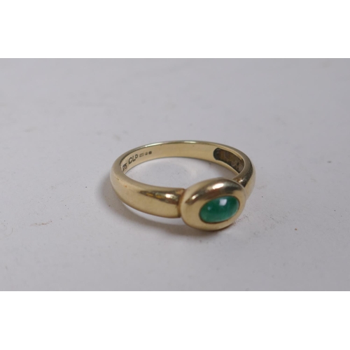 660 - A 9ct gold ring set with a green crystal stone, size P, 3.1g gross