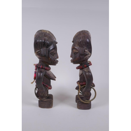 69 - A pair of African Yoruba tribe carved wood Ere Ibeji figures, 28cm high