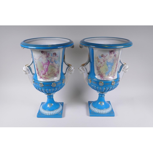 71 - A pair of Sevres style porcelain two handled urns with decorative panels depicting classical maidens... 