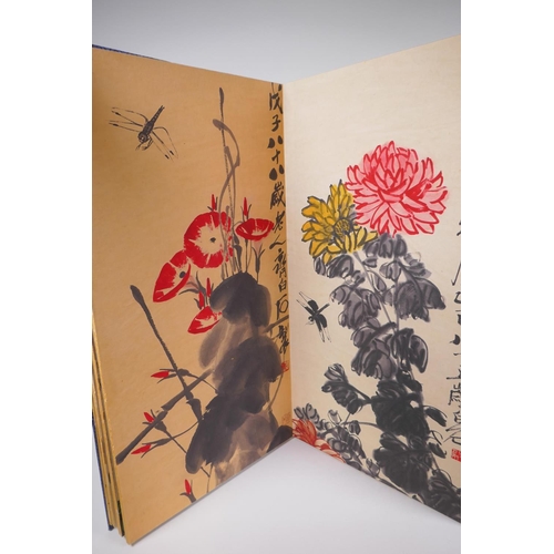 73 - A Chinese printed concertina watercolour book depicting insects, birds, flowers and fruit, 30 x 59cm