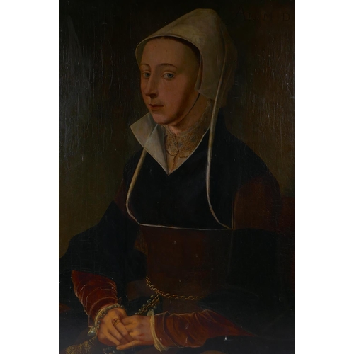 801 - A portrait of a lady in a black dress, bears date 1528, oil on oak panel with later cradle support, ... 