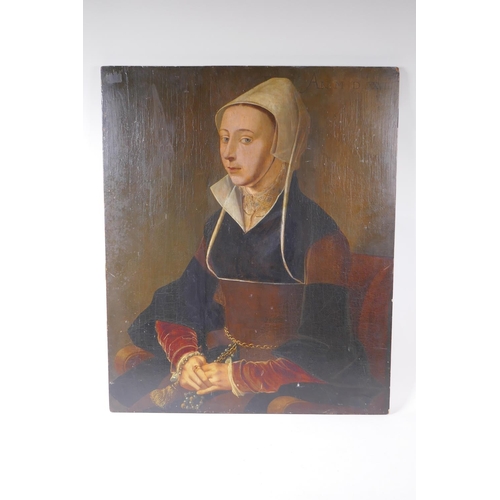 801 - A portrait of a lady in a black dress, bears date 1528, oil on oak panel with later cradle support, ... 