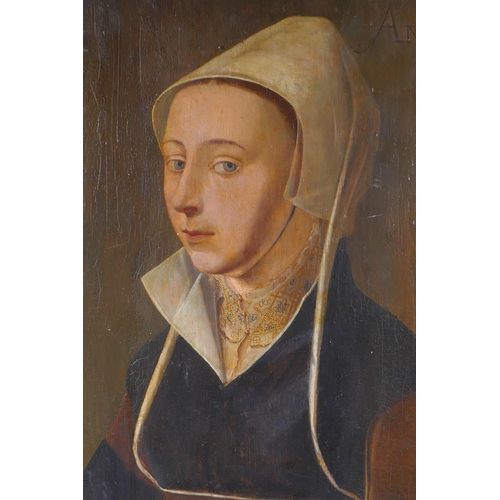 801 - A portrait of a lady in a black dress, bears date 1528, oil on oak panel with later cradle support, ... 