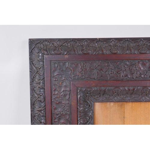 820 - A C19th elaborately carved mahogany frame, 25 x 25cm