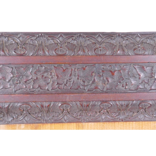 820 - A C19th elaborately carved mahogany frame, 25 x 25cm