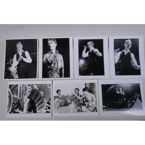 101 - A collection of seven black and white press photographs of David Bowie circa 1976, including some by... 