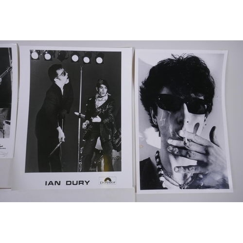 102 - A collection of black and white press photographs of punk bands/musicians including Hugh Cornwell, S... 