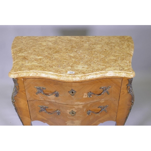 1020 - A continental inlaid tulipwood commode with marble top, drawers and serpentine front, raised on shap... 