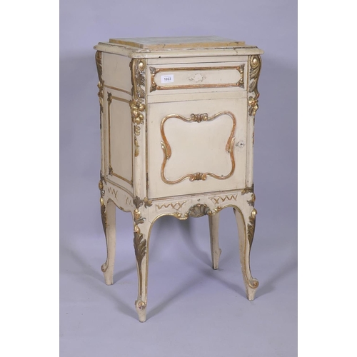 1023 - A late C19th/early C20th Italian painted and parcel gilt pot cupboard, with marble top, single drawe... 