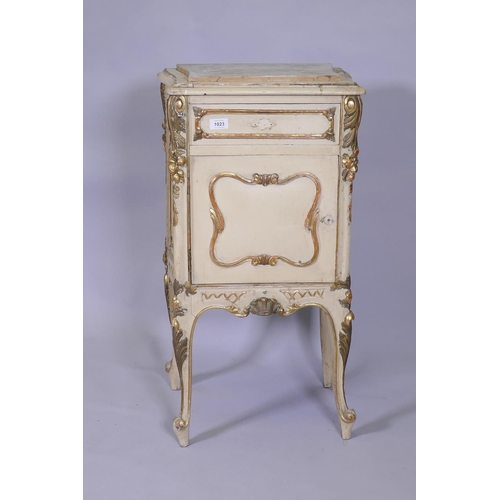 1023 - A late C19th/early C20th Italian painted and parcel gilt pot cupboard, with marble top, single drawe... 