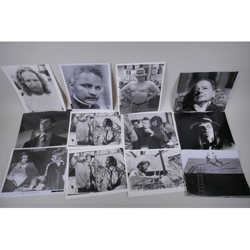 104 - A quantity of black and white press and promotional photographs relating to films, including The Roc... 