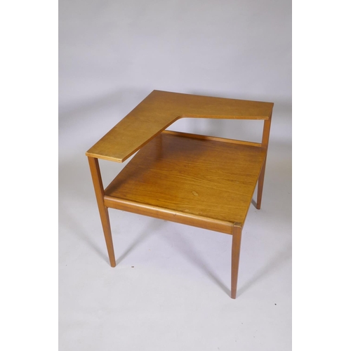 1046 - A mid century teak two tier occasional table in the manner of Peter Hvidt, 66 x 61 x 63cm high