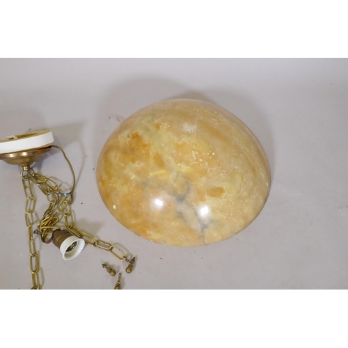 1059 - An alabaster pendant ceiling lamp shade with brass chains, 40cm diameter