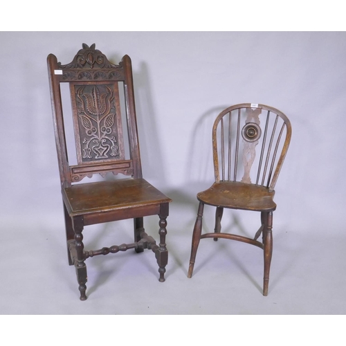 1061 - An early C19th elm wheel back dining chair with crinoline stretcher, AF, and an C18/C19th French oak... 