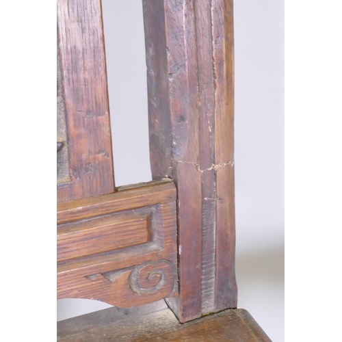 1061 - An early C19th elm wheel back dining chair with crinoline stretcher, AF, and an C18/C19th French oak... 