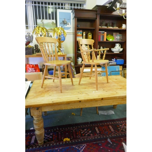 1064 - A pine farmhouse table, adapted from a pool table base, and four kitchen chairs, 102 x 200cm