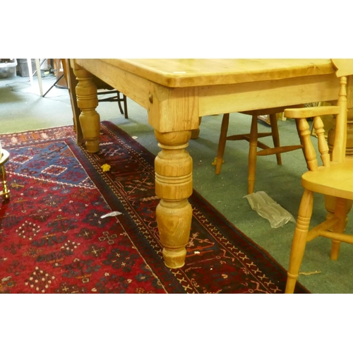 1064 - A pine farmhouse table, adapted from a pool table base, and four kitchen chairs, 102 x 200cm