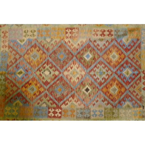 1067 - An Afghan multicolour ground wool kilim, with geometric design, 126 x 186cm