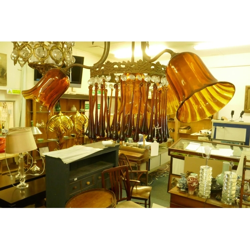 1068 - An early C19th continental pendant ceiling light with three branches and amber glass drops and shade... 