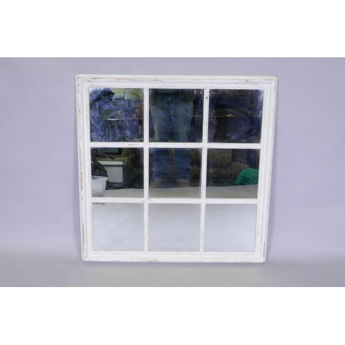 1070 - A decorative painted and distressed mirror in the form of a window, 85 x 85cm