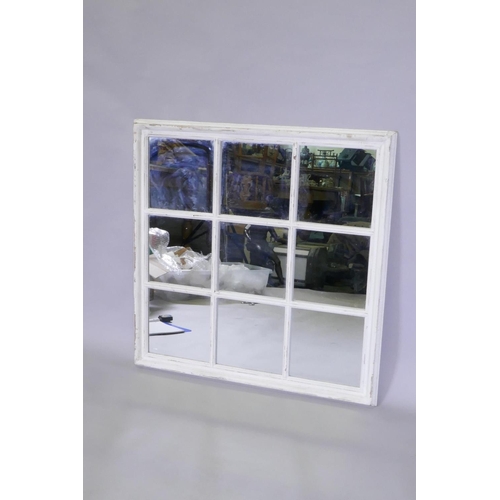 1070 - A decorative painted and distressed mirror in the form of a window, 85 x 85cm