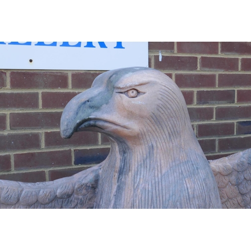 1074 - A pair of monumental carved marble eagles, 152cm high