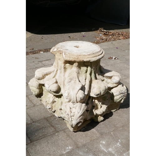 1079 - An antique carved and weathered stone capitol, 39cm high, 45cm wide