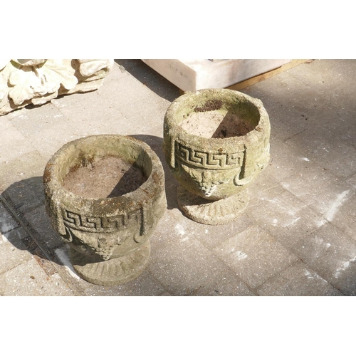 1085 - A pair of weathered concrete garden urns, 26cm high