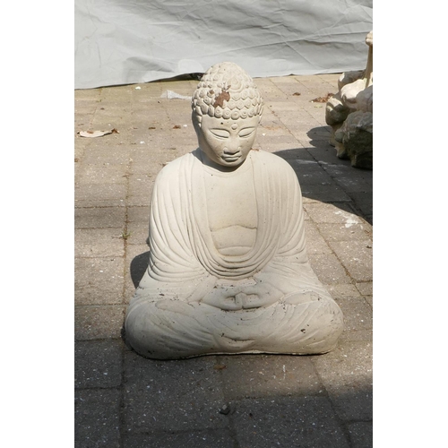 1086 - A reconstituted stone figure of Buddha, 42cm high