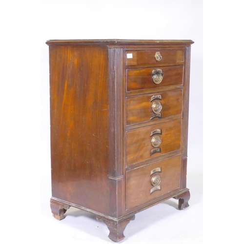 1105 - A C19th mahogany five drawer chest, with brass plate handles and painted decoration, raised on ogee ... 