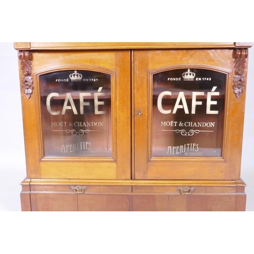 1106 - A C19th continental cabinet, with parquetry top, top and bottom frieze drawers and two glazed doors ... 