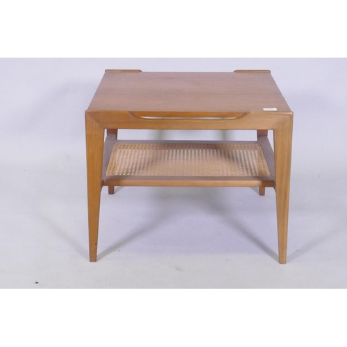 1131 - A mid century teak two tier occasional table with caned under tier, 60 x 60 x 49cm