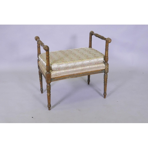 1132 - A C19th  Italian neo classical carved giltwood window seat, raised on fluted tapering supports, 63 x... 