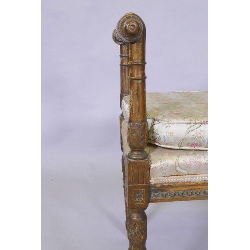 1132 - A C19th  Italian neo classical carved giltwood window seat, raised on fluted tapering supports, 63 x... 