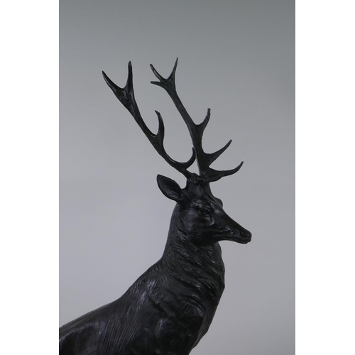 120 - After Jules Moigniez, (French 1835-1894), a bronze stag, standing on a rocky outcrop, 72cm high