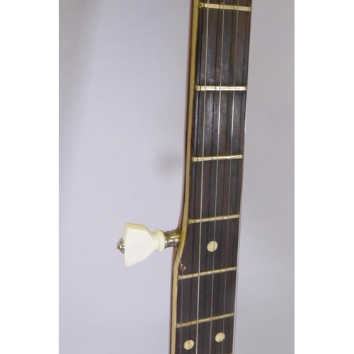 134 - A 1950s Kay five string banjo, with a carry case, 98cm long, 34cm diameter