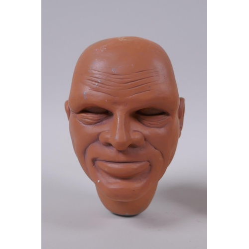 142 - Two puppet heads/maquettes by Phil Eason, relating to Gerry Anderson, largest 14cm high