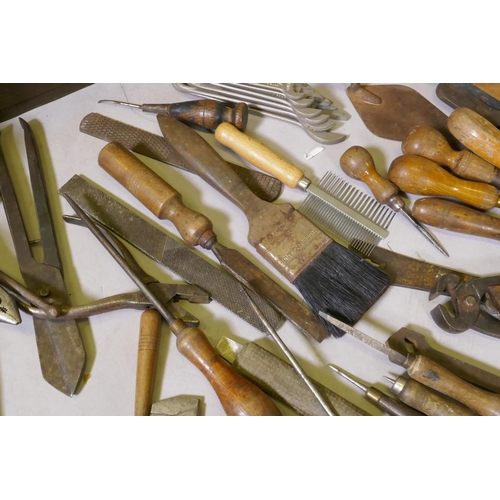 154 - A quantity of vintage hand tools, a Stanley No 4 plane, unused, Black and Decker saw etc