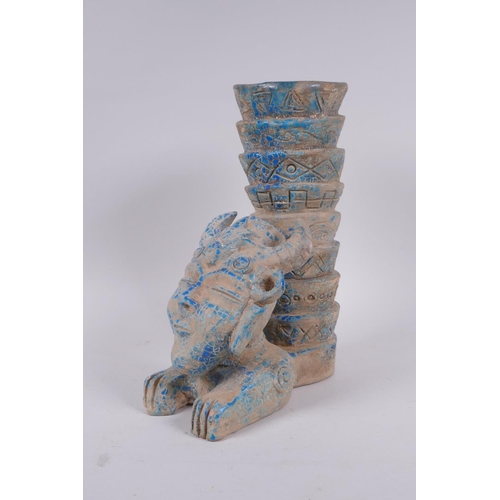 159 - An Islamic earthenware mask vase with turquoise crackle glaze, 25cm high