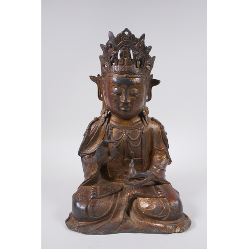 166 - A Sino Tibetan gilt bronze figure of Buddha, 31cm high