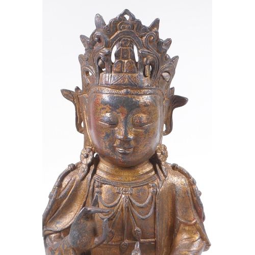 166 - A Sino Tibetan gilt bronze figure of Buddha, 31cm high