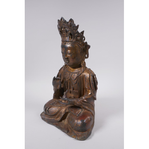 166 - A Sino Tibetan gilt bronze figure of Buddha, 31cm high